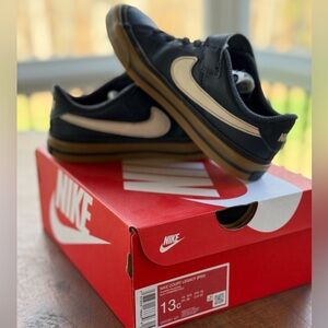 Nike Black Sneakers with Cream Swoosh and Gum Sole